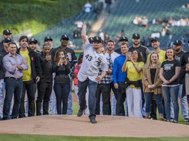 White Sox player Danny Farquhar throwing ceremonial first pitch